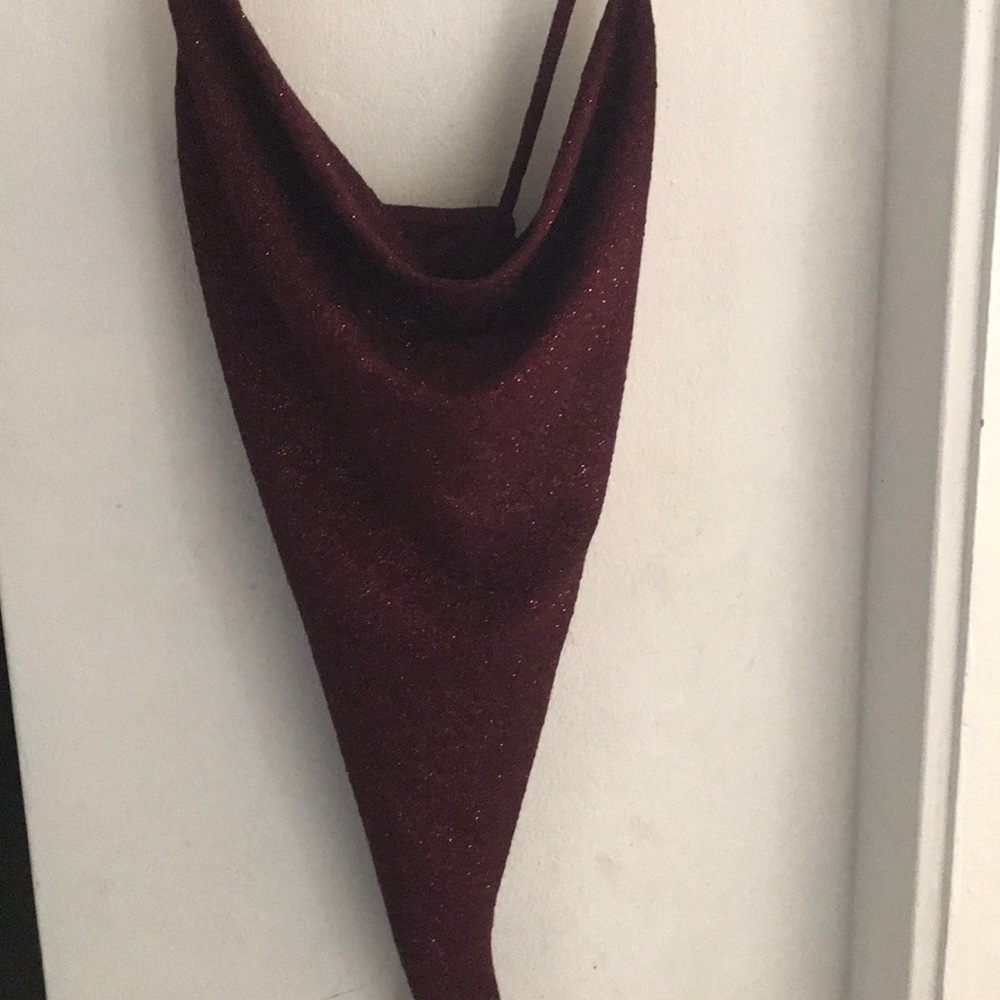 A burgundy bodysuit